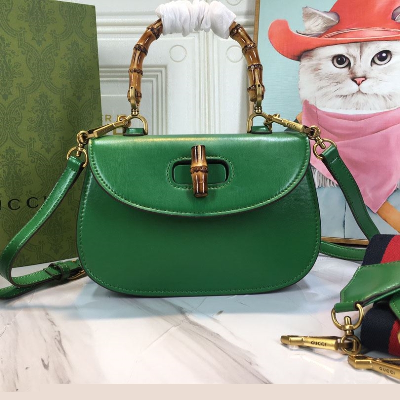 G*u*i top handle bags